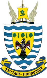 Coat of arms featuring a yellow shield with an eagle, flanked by blue and white waves.